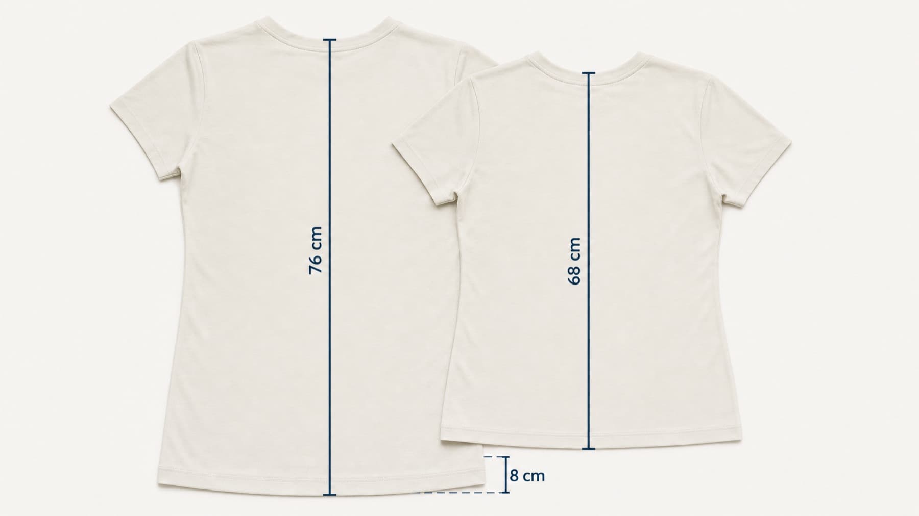 Two shirt bodies laid flat and overlapping, with the difference in hem height marked